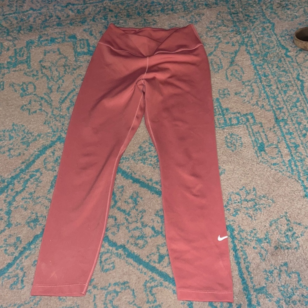 pink/salmon colored leggings , small. Worn twice.